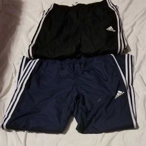 Two pairs of large adidas windpants
